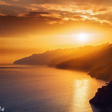 Showcase the breathtaking sunsets over the Amalfi Coast, as the sun dips below the horizon and transforms the sky into a canvas of gold and orange.