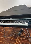 Image result for Yamaha Electric Baby Grand Piano