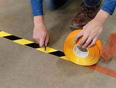 Image result for Yellow Safety Tape in Timber Work Shop Floor