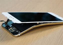 Image result for iPhone 2 Snapped in Half