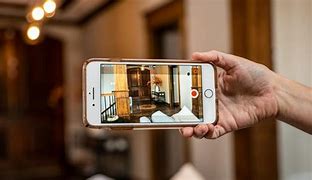 Image result for Hand Holding Phone Camera