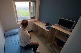 Image result for Prison Guard Looking into Cell