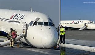 Delta flight loses emergency slide 的图像结果