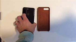 Image result for Jet Black iPhone 8 Plus with Speck Case