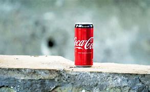 Image result for Coke and Pepsi Can