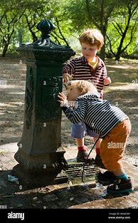 Image result for Boy Drinking Water Fountain
