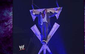 Image result for Undertaker Cross Symbol