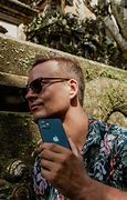 Image result for Man Holding iPhone 15 Box