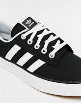 Image result for Adidas Men's White Canvas Sneakers