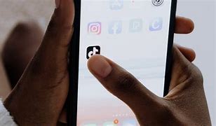 Image result for iPhone 5 in Hand