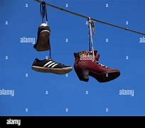 Image result for Shoes On Telephone Line