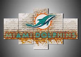 Image result for Miami Dolphins Breaking through a Wall