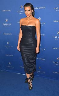 Image result for Kim Kardashian Gold Chrome Dress
