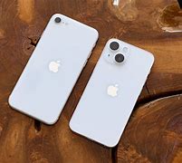 Image result for iPhone SE vs iPhone 13 Size