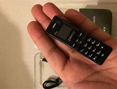 Image result for World's Smallest Cell Phone