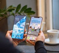 Image result for iPhone 12 Mini vs One Plus 9 Pro