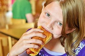 Image result for A Kid Eating a Hot Dog