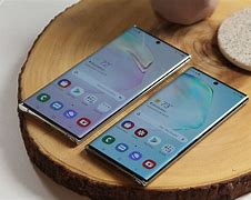 Image result for Samsung Galaxy A50 Size vs iPhone XR