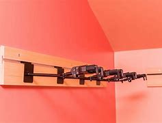 Image result for Wall Mounted Fixed Arm Hanger