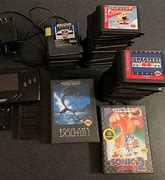 Image result for Sega Genesis Nomad with Battery Pack