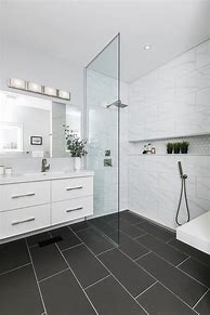 Image result for Bathroom Floor Tile Black Cabinets
