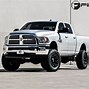 Image result for Ram 2500 4 Inch Lift with Black Rims