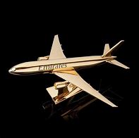 Image result for Gold Airplane Globe