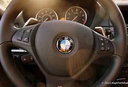 Image result for What Sports Car Has Lights On Steering Wheel