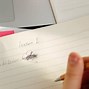 Image result for Writing in Notebook