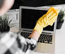 Image result for Cleaning a Laptop Stock-Photo