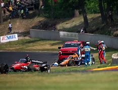 Image result for Will Power Shoves Scott Dixon