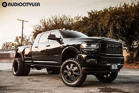 Image result for Black Ram Dually On Grass
