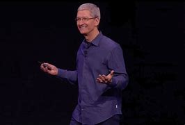Image result for Tim Cook with iPhone 12