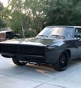 Image result for 69 Dodge Charger with Mud Tires