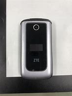 Image result for ZTE 233 Cymbal Flip Phone