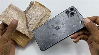 Image result for Broken iPhone 11 Pro Max in a War Zone