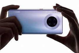 Image result for Huawei Phone with Four Cameras