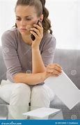 Image result for Concerned Woman Holding Phone