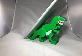 Image result for Dino Phone Holder