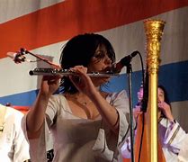 Image result for Lady Playing Flute