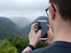 Image result for Person Using Cell Phone