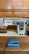 Image result for Nelco Sewing Machine with Flip Down Case
