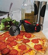 Image result for Pizza Cutter Brass Knuckles