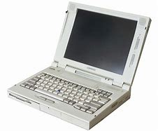 Image result for Image of the Backside of Compaq Laptop