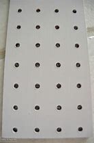 Image result for Pegboard Pin Studs Home Depot