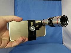 Image result for iPhone 13 into a Telescope
