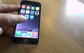 Image result for Space Gray iPhone 6 Plus in a Hand