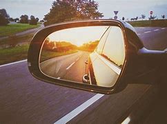 Image result for Car Mirror Reflection Bright