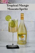 Image result for Girl Pouring Mango Moscato into a Flask