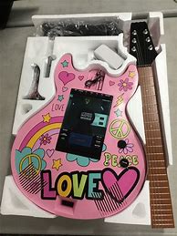 Image result for Guitar-Shaped CD Player